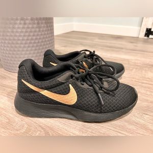 Women NIKE Back and Gold Running Shoes